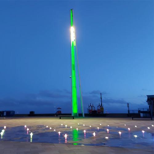 The lights at City Beach lit up green